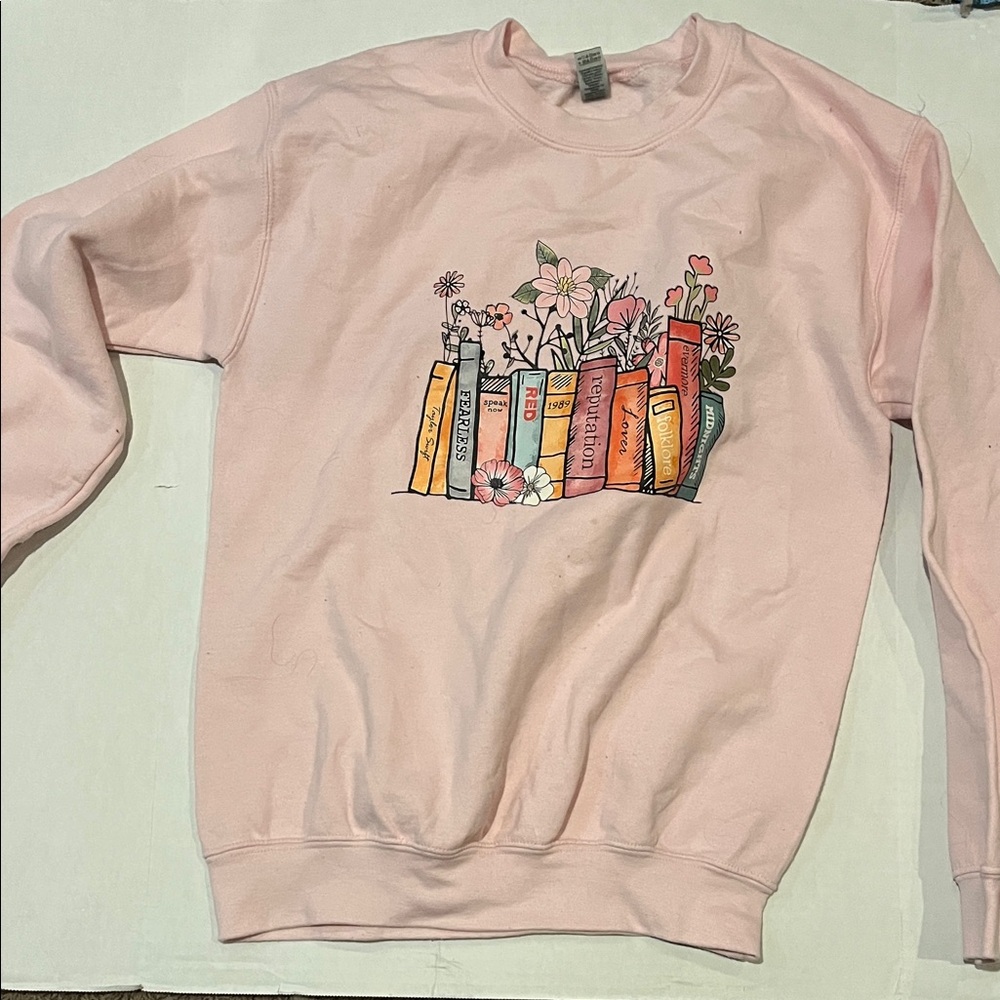 Taylor Swift sweatshirt with Era books